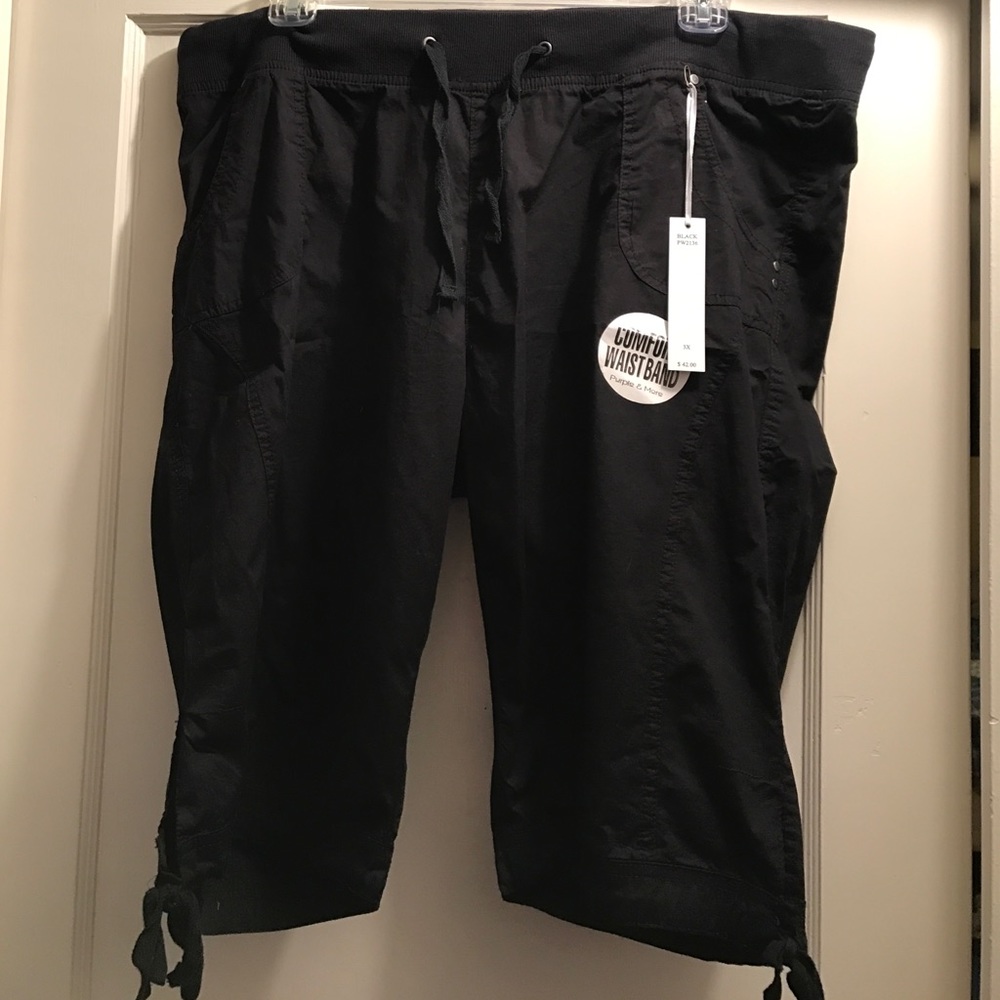 NWT long black shorts 3x but I think run small.